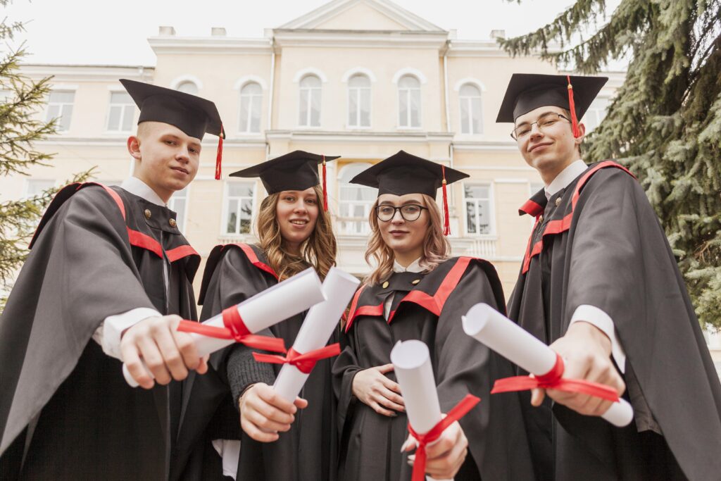 group colleagues with diploma